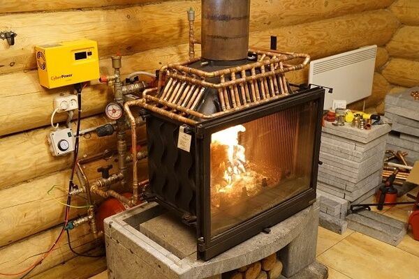 Как сделать печное отопление в частном доме с воздушным или водяным контурами